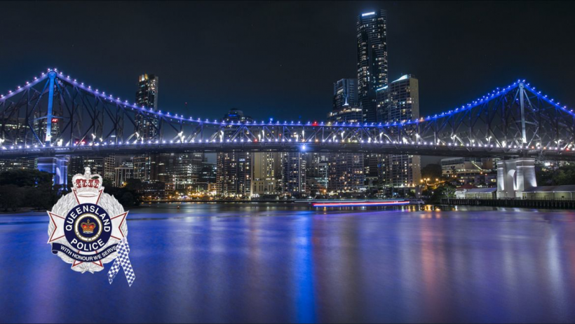 Picture of Brisbane city with Queensland Police logo